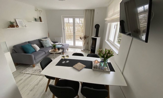 Lietzow Appartement | Comfortable vacation apartment with balcony, sauna and Bodden view