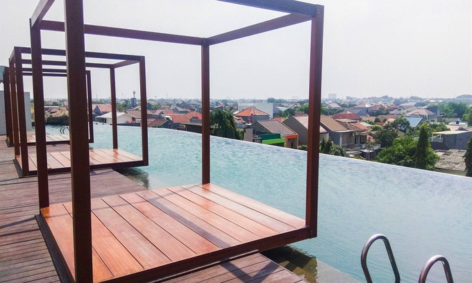 Bekasi Barat Appartement | Comfy and Simply Studio Room at Grand Kamala Lagoon Apartment