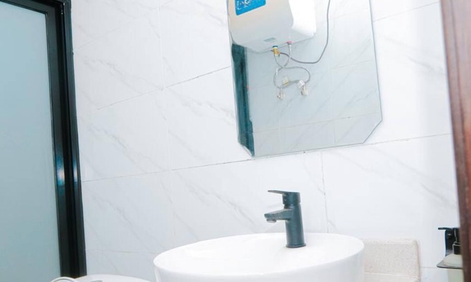 Ngiri-Ngiri Appartement | Comfy hotel suites in vibrant Kinshasa with WiFi, AC