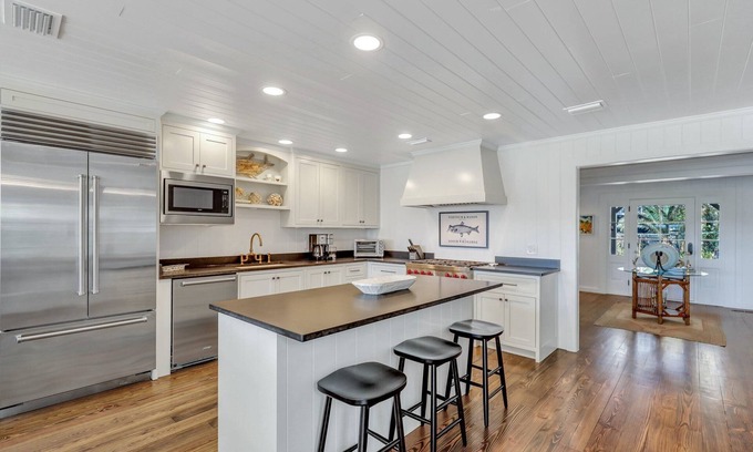 East Beach Maison | Completely Renovated Ocean Front Home! Easy Walk To BEACH | Heated Pool | Sleeps 12