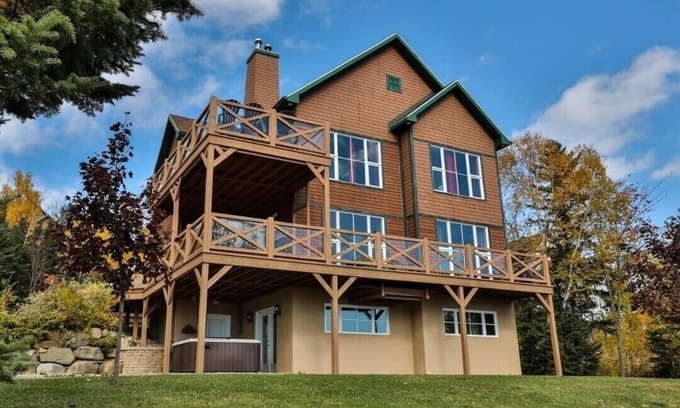 Petite-Riviere-Saint-Francois Copropriété | Condo 120H | Chaleureux, foyer et vue fleuve
