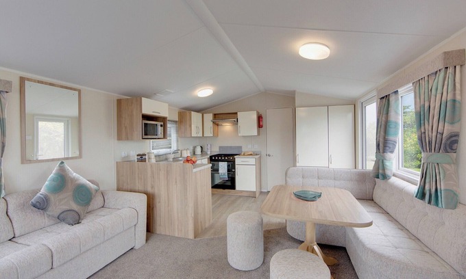 Kilwinning Maison | Contemporary caravan with one double with TV, and two twin.