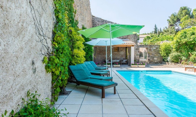 Tourouzelle Maison | Gite Coquelicot - Gite de luxe avec climatisation et piscine chauffe.