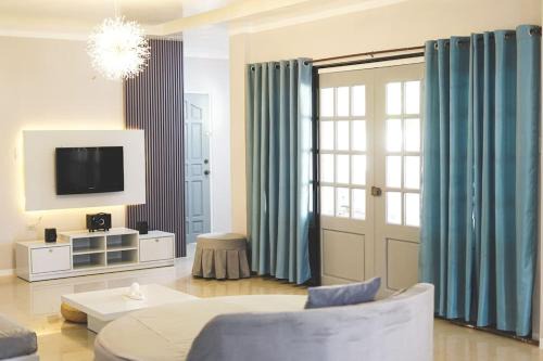 Guinayangan Maison | CosiHome Guesthouse