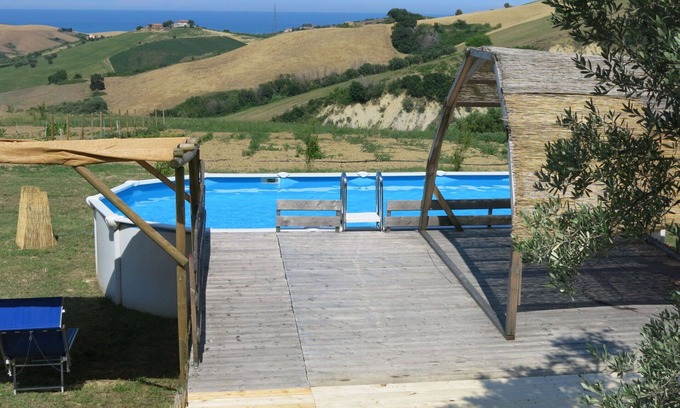 Cologna Spiaggia Villa | Appartement dans une maison de vacances avec piscine, WIFI, climatisation, bain à remous, TV, patio