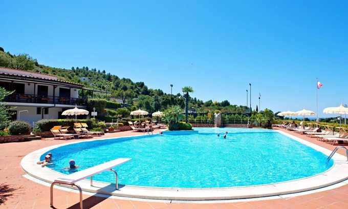 Sperlonga Appartement | Agréable appartement avec piscine, climatisation, WIFI, TV, animaux admis et parking