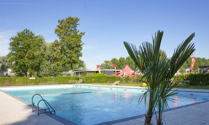 Dordtse Biesbosch Appartement | Agréable appartement dans une maison de vacances pour 6 personnes avec piscine, WIFI, TV et parking