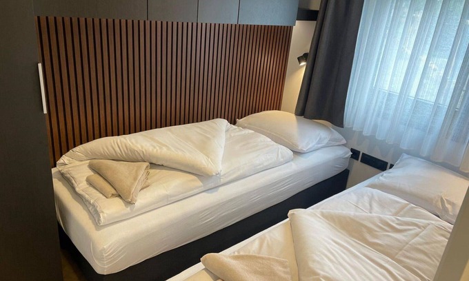Ossiach Maison | Bel appartement dans une maison de vacances pour 4 personnes avec WIFI, TV et terrasse