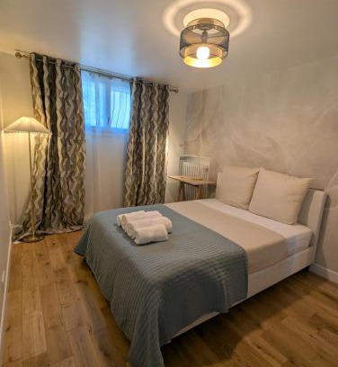 Saint-Gratien Appartement | Cosy appartment with access to garden, parking and direct line to Eiffel tower
