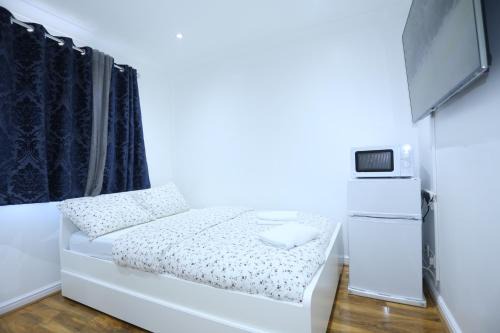 Thamesmead East Appartement | Cosy Room with en-suite bathroom and shared kitchen