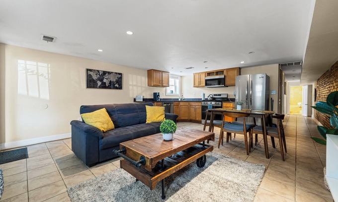 Columbia Heights Maison | Cozy 2 bedroom/1.5 bathroom English basement townhome. Spacious, safe, and family-friendly with open kitchen, dining area, and crib. Easy access to shops, restaurants, and DC attractions.
