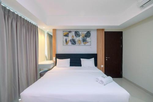 Mampang Prapatan Appartement | Cozy 2BR Apartment Nine Residence with City View By Travelio