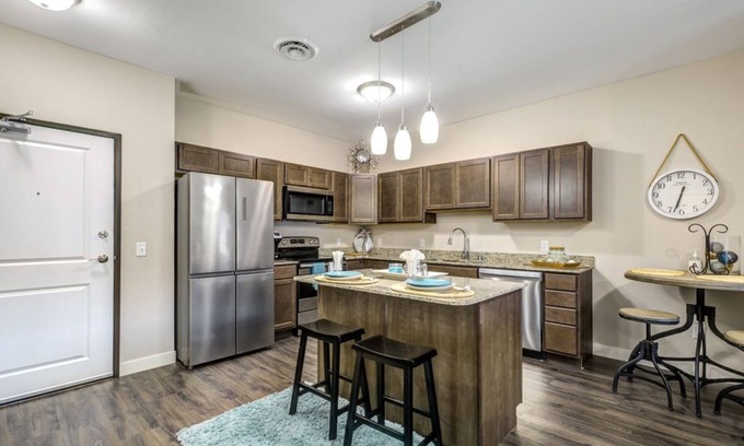 Mankato Maison | Cozy Apartment in Clubhouse building at Woodside Apartments