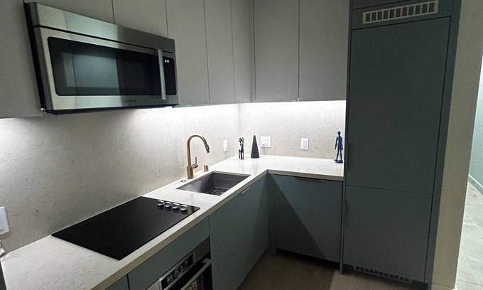 Carthay Circle Appartement | Cozy apartment in LA with WiFi, AC, fitness room sauna steam room sauna and pool