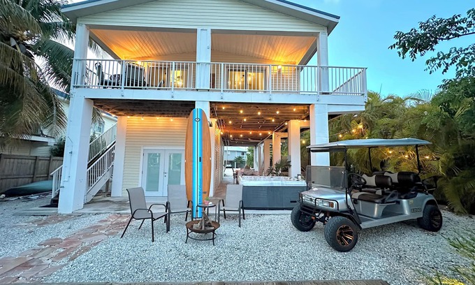 Cutthroat Harbor Estates Maison | Cozy Canal-Front Home in Cudjoe Key — Dock, Hot-Tub & Golf Cart Included!
