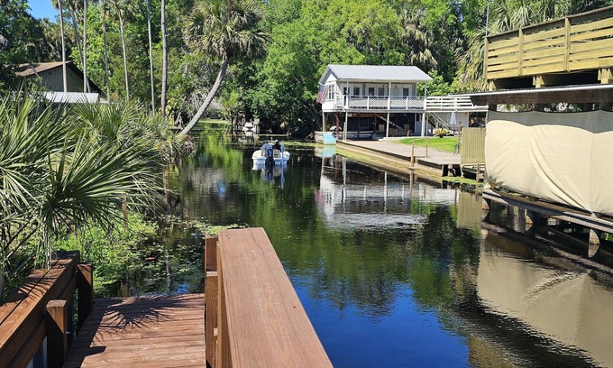 Astor Maison | Cozy canal front house with its own boat ramp and dock. Amazing waterfront view.