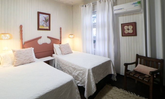 La Cruz Maison | Cozy hotel-style suite with private bathroom, on-site dining, & fast WiFi