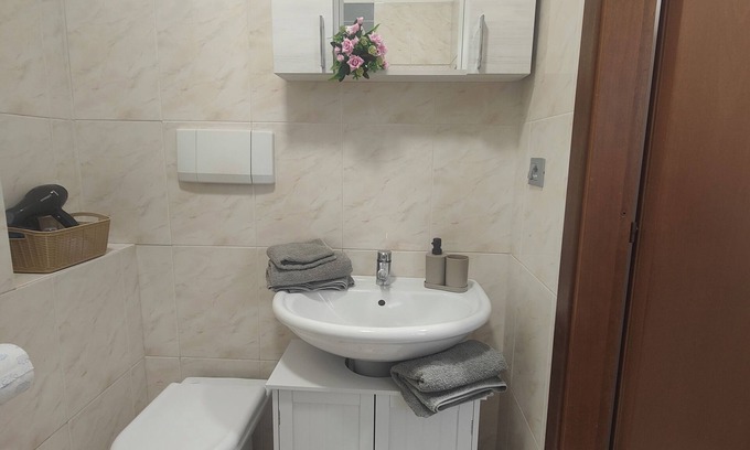 Cuneo Nuova Maison | Cozy one-bedroom apartment in the heart of Cuneo perfect for any business.