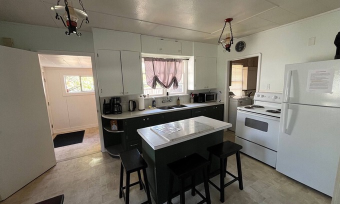 Duncan Maison | Cozy rustic 50's home located on a campground beside the Famous Cowichan River.
