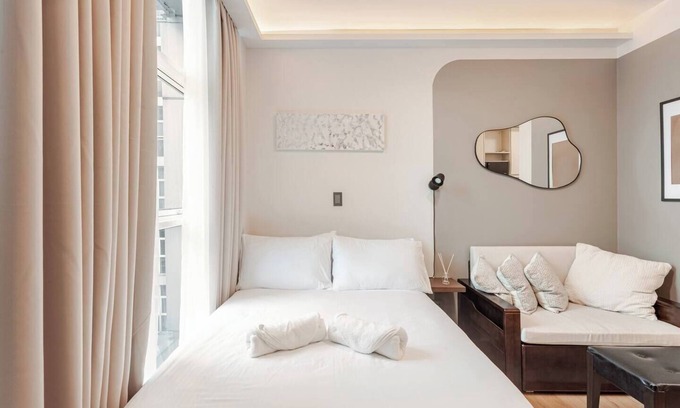 Palanan Copropriété | Cozy Studio 1 Bed condo with WiFi, AC in Makati