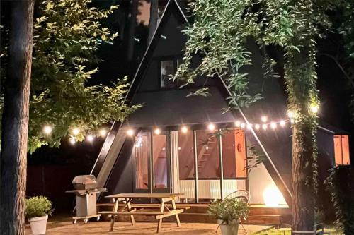 Rekem Chalet De Ski | Cozy warm chalet in wooden nature near Maastricht-Gothamette House