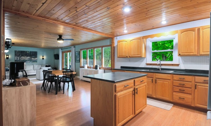 Paris Maison | Crystal Rapids Retreat: Your Muskegon River Summer Getaway Awaits!