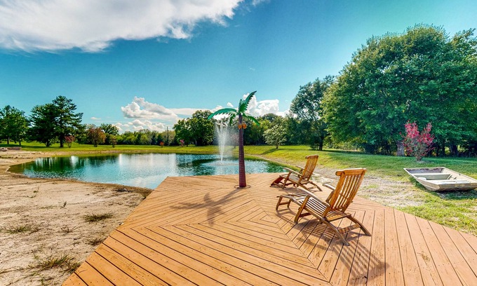 Waller Maison | Custom home with guesthouse, pond, sunning deck, beach & tropical bar