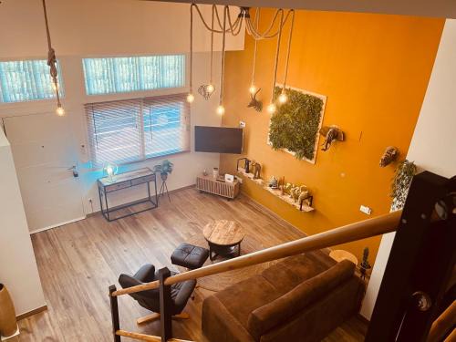 Poblats Maritims Appartement | Dúplex tipo loft de estilo selvático y safari, con encanto y a pasos del mar