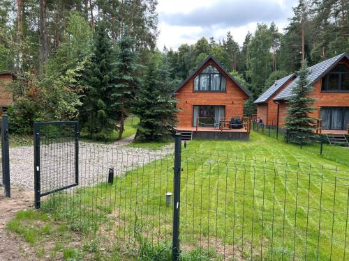Biskupiec Maison | Dadajówka Domki i Apartamenty przy plaży