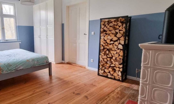 Nauen Appartement | Das Kaminzimmer im Forsthaus Nauen