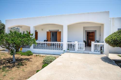 Leros Maison | Debbie's Holiday Home with sunset
