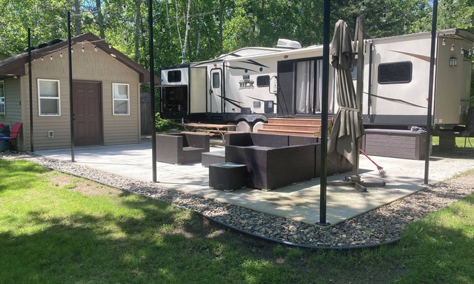 Nevis Maison | Deer Lake lakefront lot with sandy beach, camper, bathhouse. Minutes from Nevis.