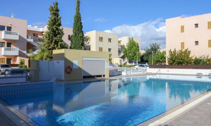 Universal Appartement | Charmante deux chambres et deux salle de bains Appartement avec une grande piscine