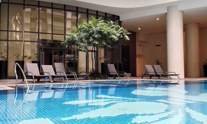 Pinagsama Copropriété | Deluxe 1BR 27th floor in Taguig/BGC w/balcony, amazing view of bay, wi-fi+55" TV