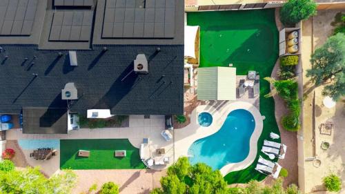 Avant Maison | Desert Oasis Resort Style Backyard Sleeps 18 Games