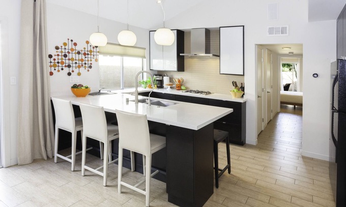 Uptown Design District Copropriété | Designer Condo With Wrap Around Patio Located in the Famous Movie Colony
