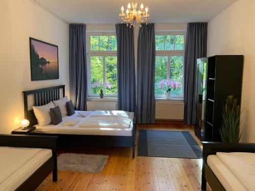 Gehlsdorf Appartement | DEUTSCHE VILLA - SUPERIOR APARTMENT- 1 Obergeschoss mit gem Sauna und Garten