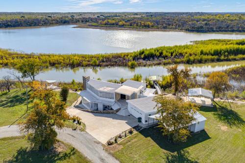 Runaway Bay Maison | Dock and Fire Pit Riverfront Runaway Bay Retreat