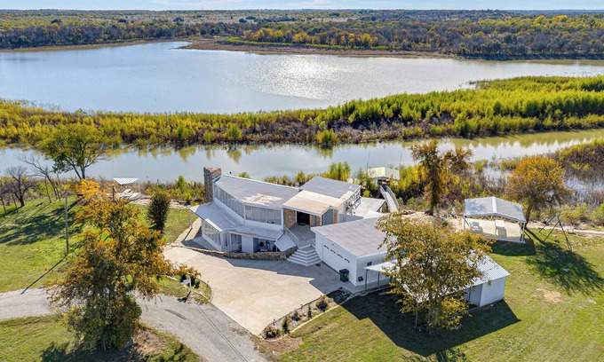 Runaway Bay Maison | Dock & Fire Pit: Riverfront Runaway Bay Retreat