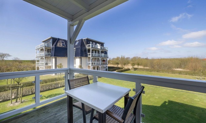 Wremen Appartement | Dog-friendly vacation apartment near the beach with sauna and balcony with beach chair - Resort Deichgraf