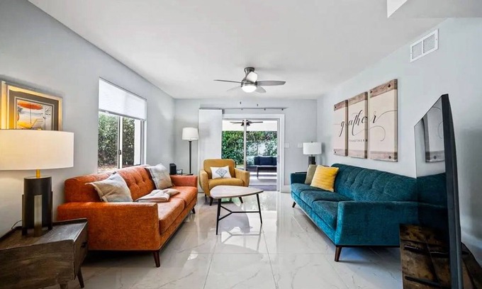 Isles of Capri Copropriété | Dog-friendly colorful condo with shaded patio, washer/dryer, & central AC