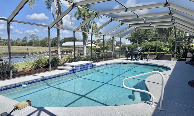 Isle of Palms Maison | Dog-friendly waterfront home with private dock, boat lift, pool and spa