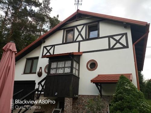 gmina Biskupiec Maison | Dom w Gaju nad jeziorem Dębno