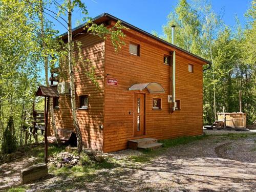 Kunratice u Cvikova Maison | Domek nad skálou