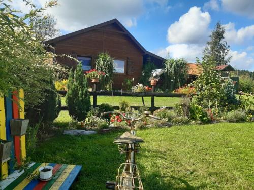 Warpuny Maison | Domek w Kwiatach