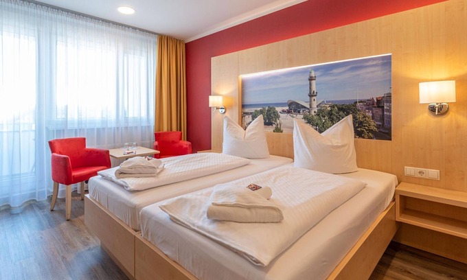 Sudstadt Maison | Doppelzimmer mit Balkon - Das Hotel an der Stadthalle Rostock