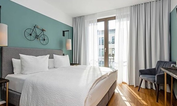 Bad Saarow Appartement | Doppelzimmer Terrasse, Dusche / WC - Velotel Bad Saarow