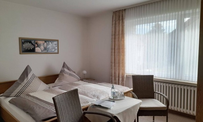 Bad Driburg Appartement | Double room, bathroom, WC - vacation apartment and guest room Iburgblick