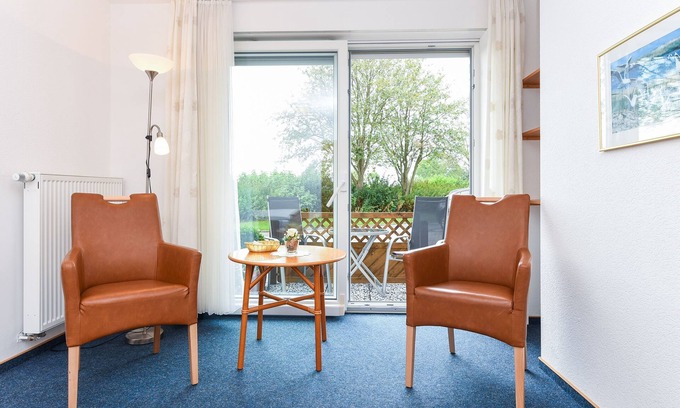 Neuharlingersiel Cottage | Double room with balcony or terrace - Double room in the Hotel-Pension Marlies