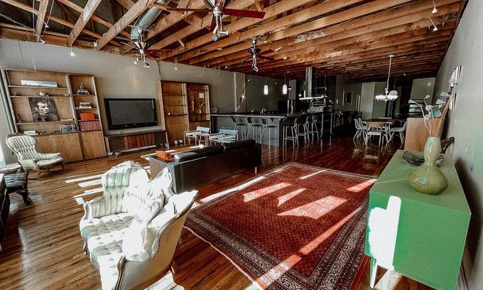 Enid Maison | Downtown loft apartment with excellent views, furnishings and location on square